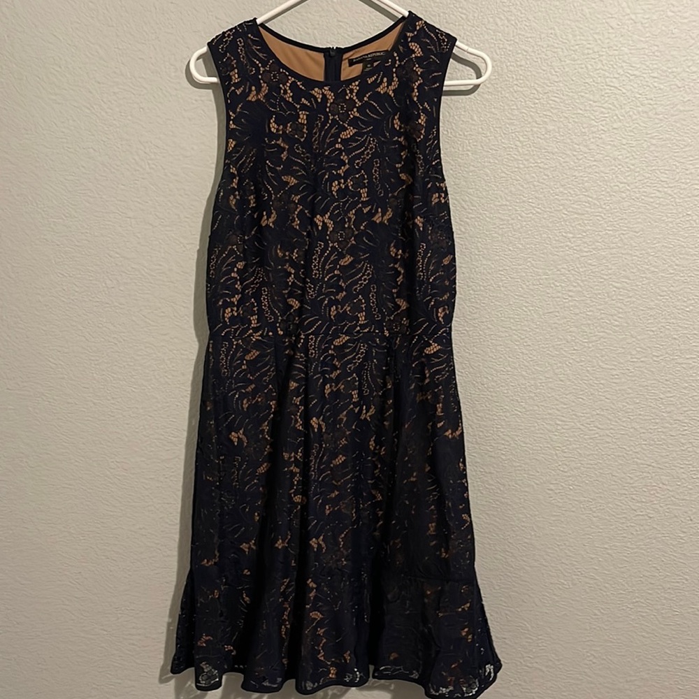 Navy lacy blue dress with tan slip under it. Size 12. Banana Republic